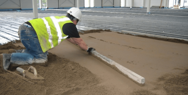Sand and cement screed installation for strong level flooring base